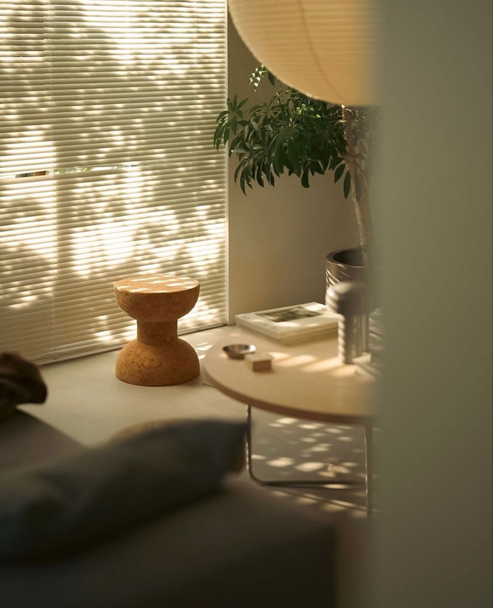 A warm toned bedroom furnished and styled for a short term rental listing